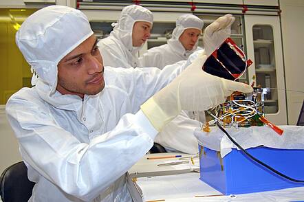 Image: Students constructing a mini-satellite 