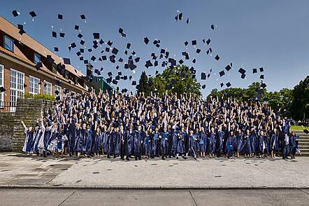 Image: Students celebrate their graduation.